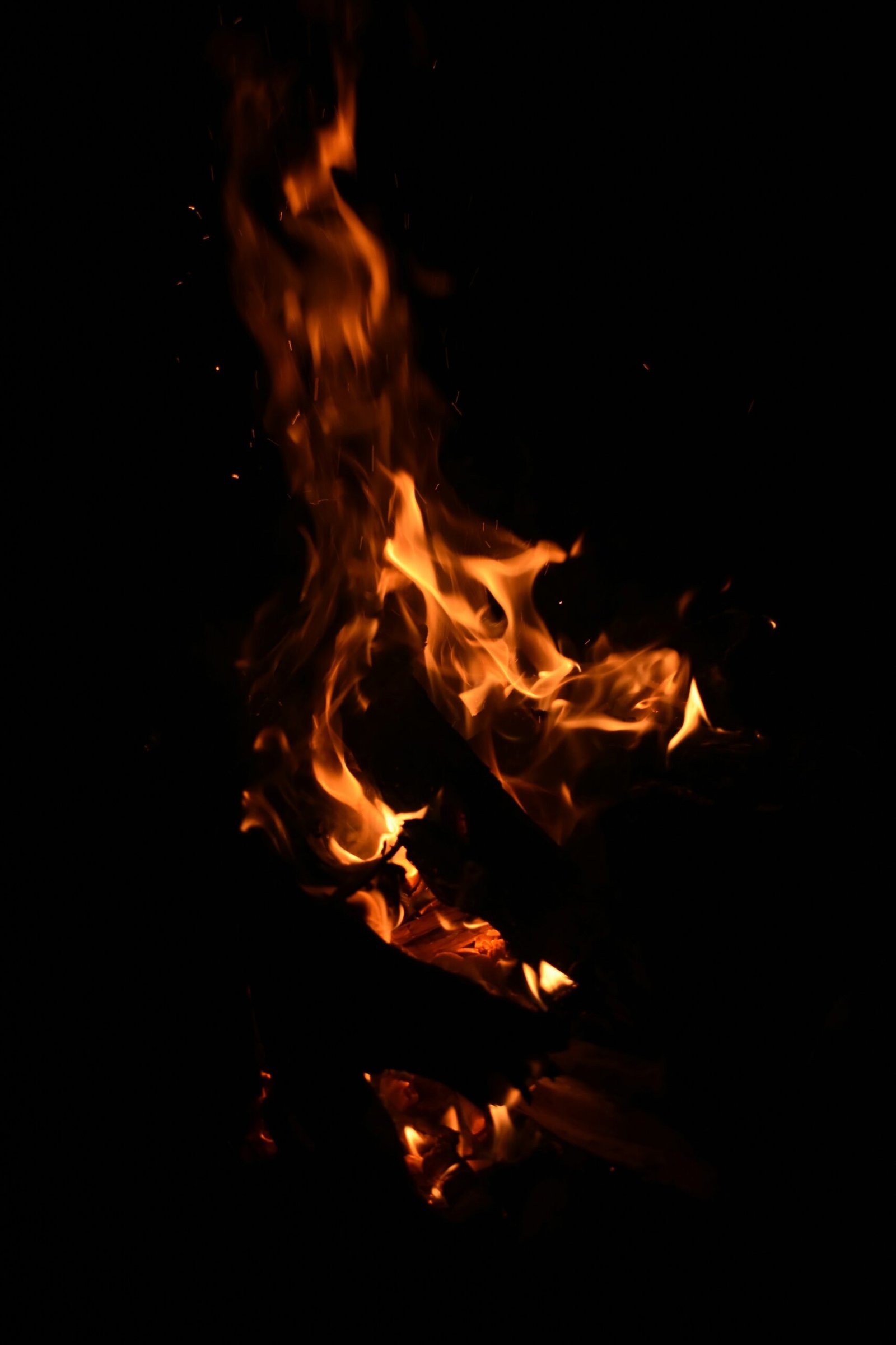 fire in black background with black background